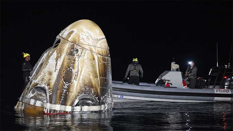 4 astronauts return to Earth after being delayed by Boeing's capsule trouble and Hurricane Milton