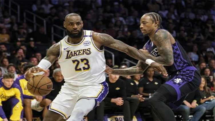 James triple-double helps Lakers hold off Kings, Clippers down Nuggets