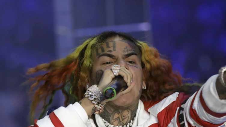 Rapper Tekashi 6ix9ine is detained in New York on parole violation claims