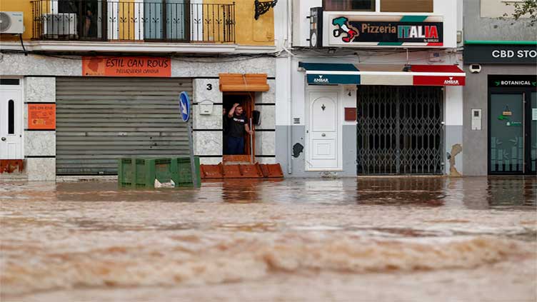 At least 13 dead in eastern Spain flash floods, TVE reports