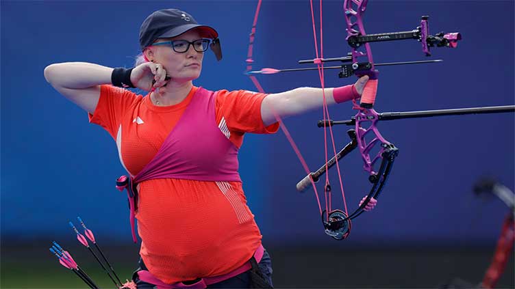 British archer Jodie Grinham makes history by winning bronze while seven months pregnant