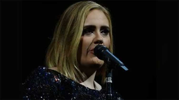 Adele announces indefinite break from music