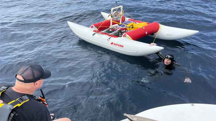 US Swimmer will try again to cross Lake Michigan after first success in 1998