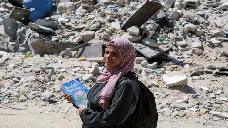 Dunya News Gaza teacher offers ray of hope with classroom in rubble