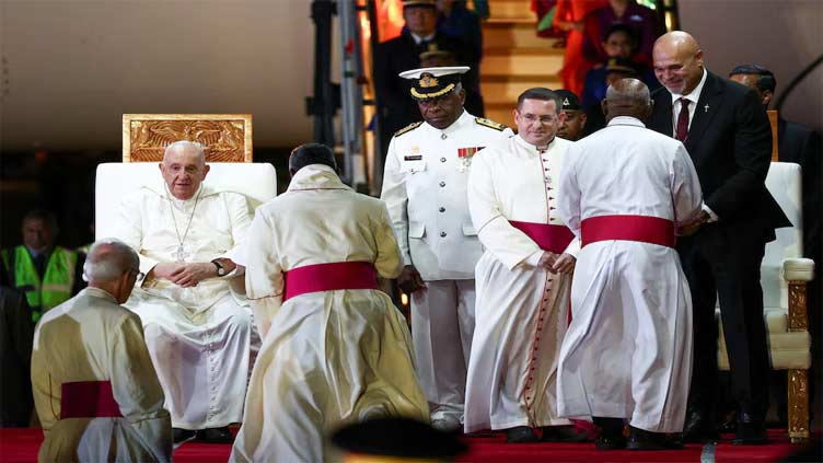 Pope Francis arrives in Papua New Guinea, country two of 12-day trip