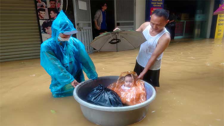 At least 143 dead as Vietnam reels from impact of Typhoon Yagi