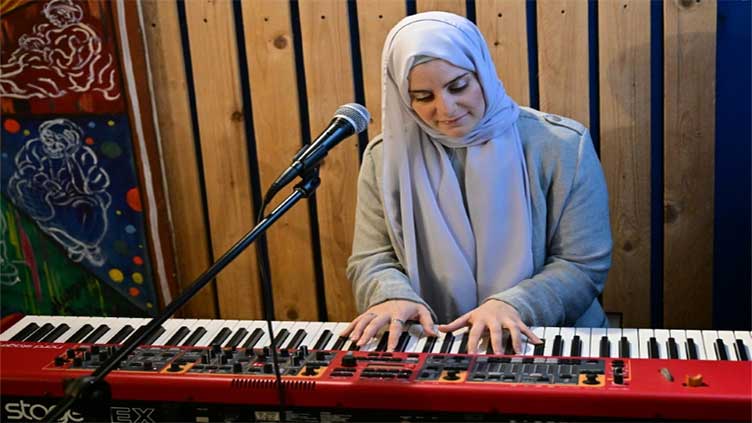 Syrian Hijab singer attracts millions of views