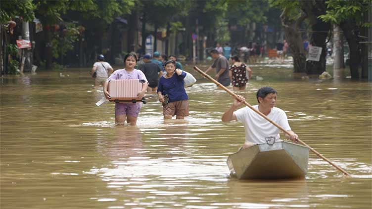 Vietnam death toll climbs to 197 as typhoon's aftermath brings flash floods and landslides