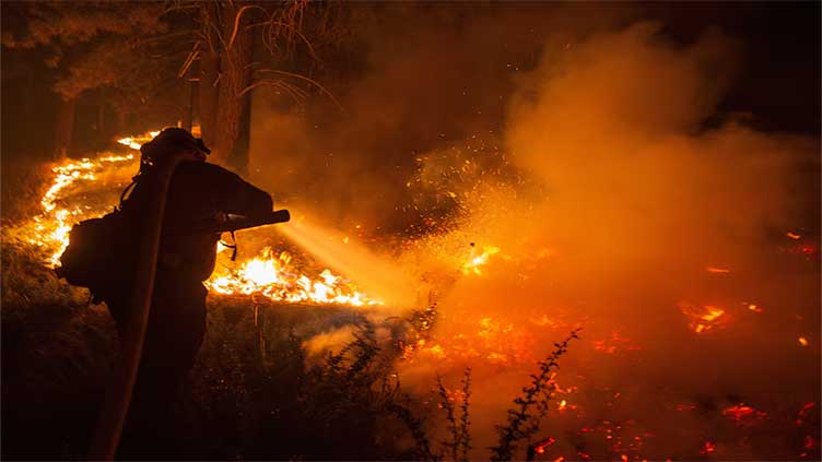 California wildfires burn dozens of homes, ski resort