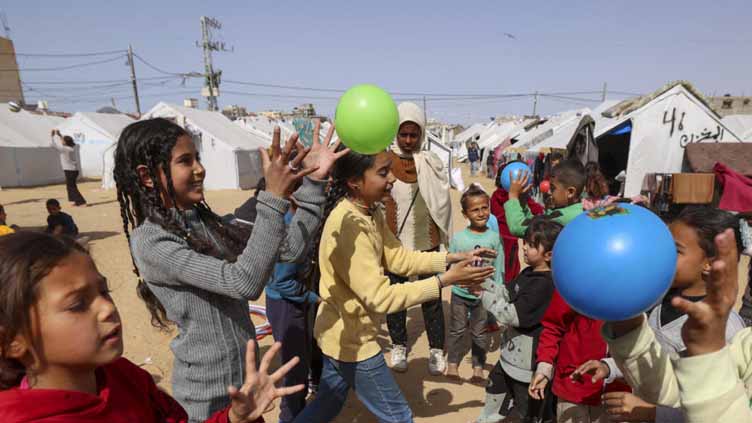 Angels who make children smile in war-torn Gaza