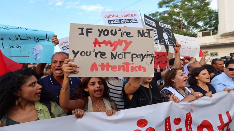 Tunisians protest against president ahead of election