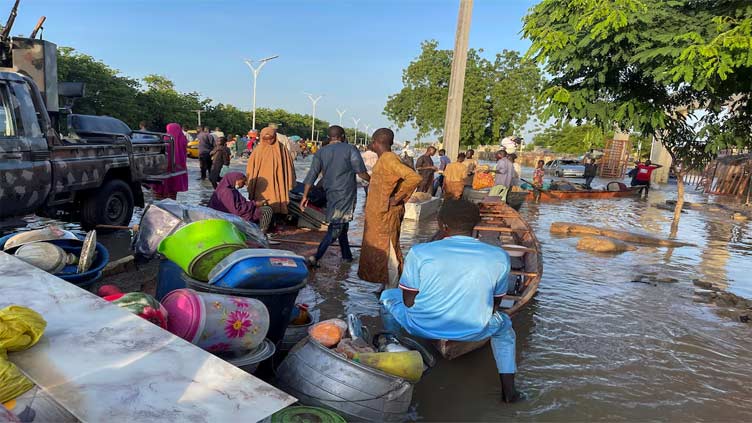 Nigeria's flood-hit residents lament expensive canoe rides