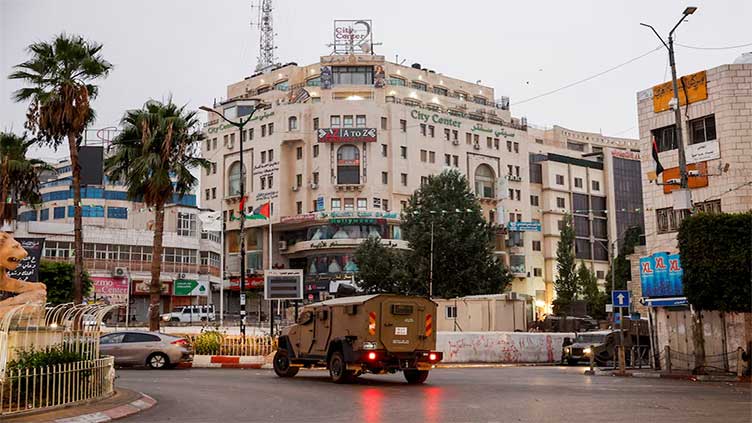 Israeli forces raid Al Jazeera bureau in West Bank with closure order