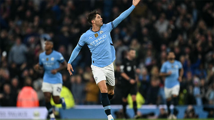 Stones salvages point for Man City against 10-man Arsenal