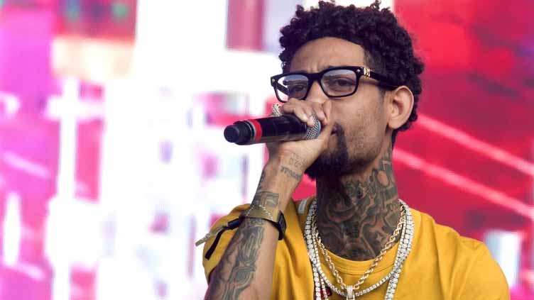 Man convicted of sending his son to rob and kill rapper PnB Rock gets 31 years to life