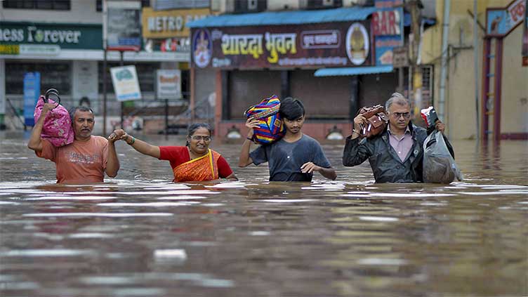 Heavy rains paralyse Mumbai, at least four dead