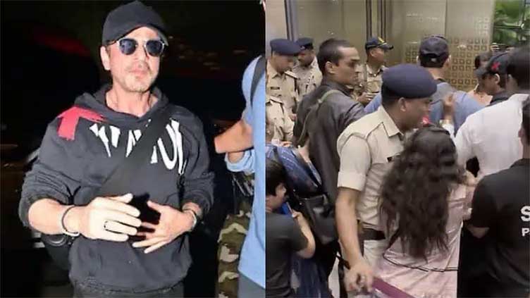 Girl goes into frenzy to see Shah Rukh Khan at airport 