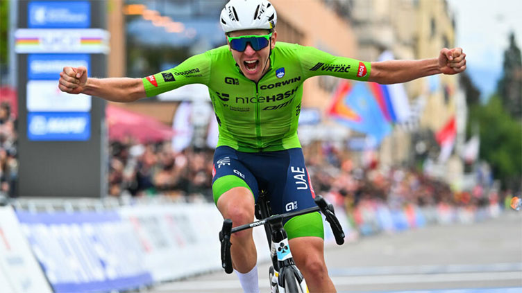 Pogacar on top of the world after sealing cycling triple crown