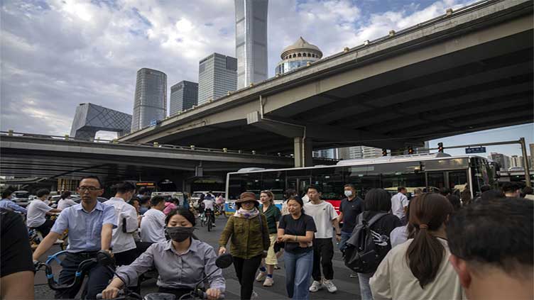 China factory surveys show economy weakening, as Beijing steps up support