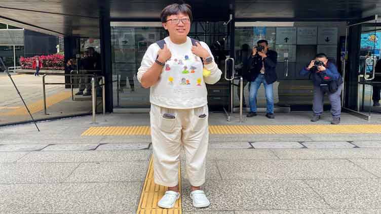 After retrial, Hong Kong court jails social worker to nearly 4 years for rioting