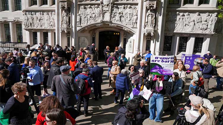 In landmark ruling, UK's top court says legal definition of woman refers to biological sex