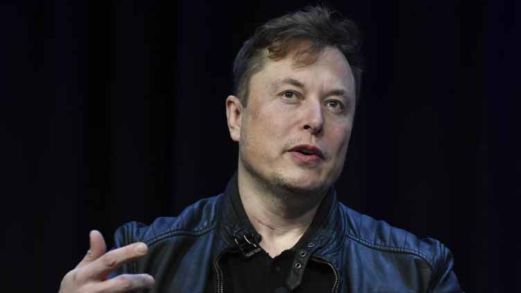 Musk says he'll spend less time in Washington and more time running Tesla after its profit plunges