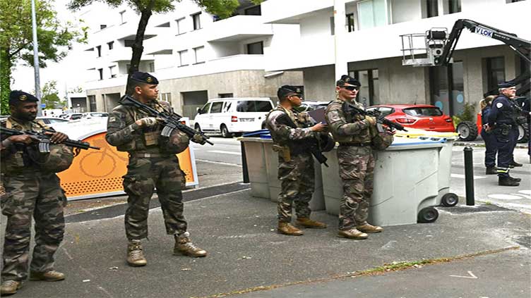 French youth kills student, wounds three, in school knife attack