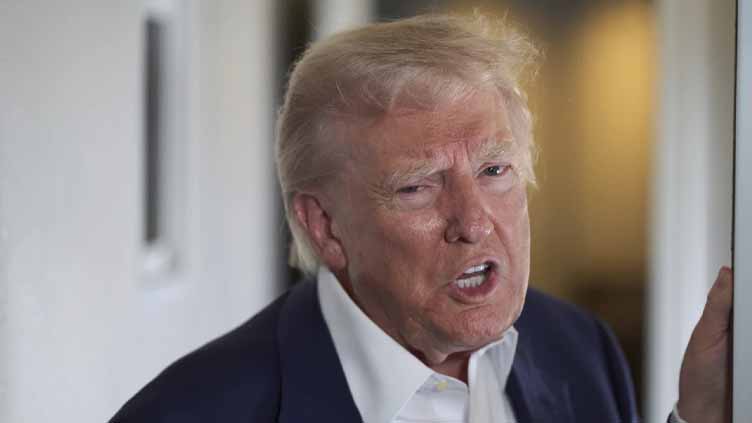 Only about half of Republicans say Trump has focused on the right priorities, AP-NORC poll finds