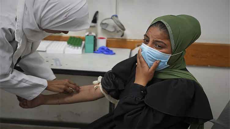 A pregnant woman in Gaza's ruins fears for her baby under Israel's blockade