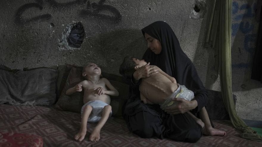 Israeli fire kills at least 18 in Gaza