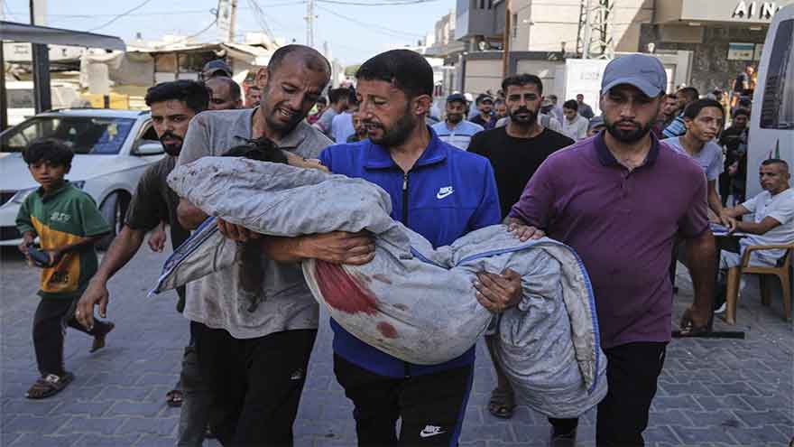 Israeli forces kill over 20 people seeking food in Gaza, witnesses and health officials say