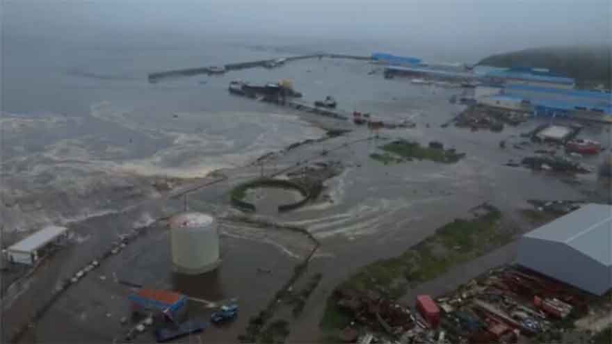 Russia cancels tsunami warning for Kamchatka after quake, dormant volcano erupts