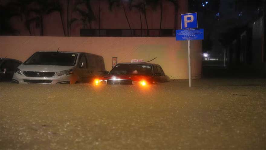 Hong Kong issues highest weather warning, as rains shut schools, courts and hospital wards