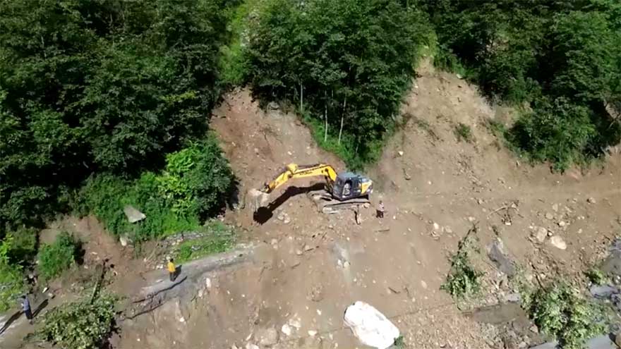 Indian helicopters rescue people stranded by flooding in Himalayan state