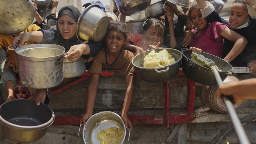 Baby girl killed with parents in Gaza airstrike as Israelis urge a mass protest over the war
