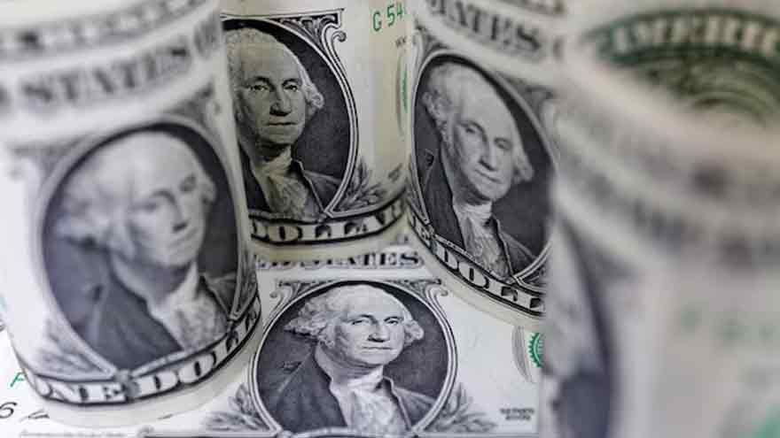 Dollar bides time as markets brace for Ukraine summit