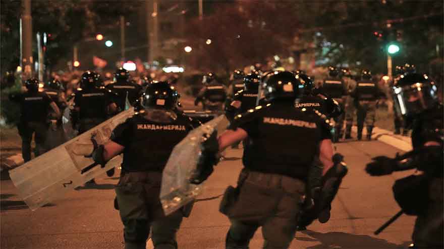 Police chase anti-government protesters in Serbia as president pledges crackdown