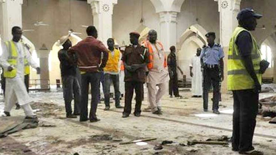 Gunmen kill at least 13 people in a mosque shooting in northwestern Nigeria