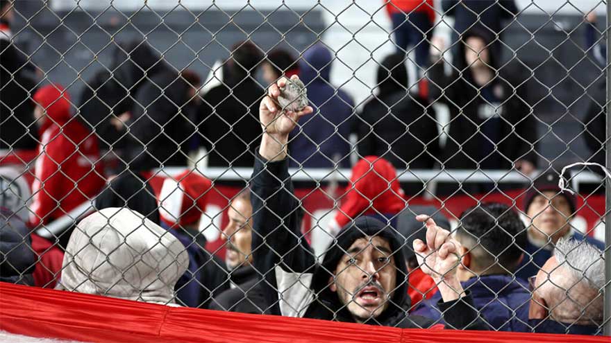 Ten hurt, 90 arrested as match abandoned following fan violence in Argentina