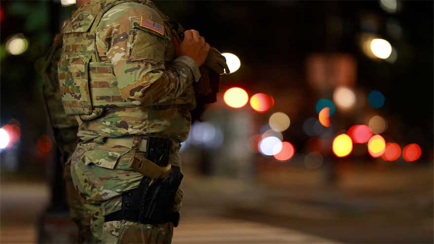 US National Guard troops in Washington to begin carrying weapons, officials say