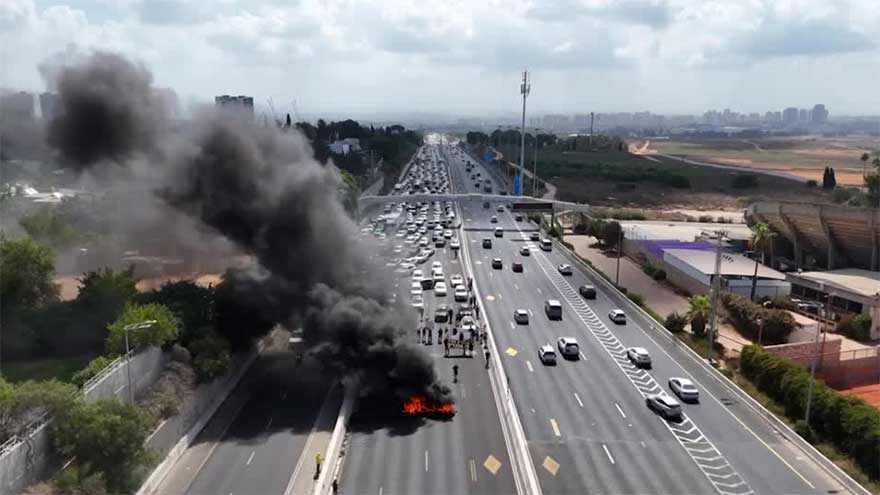Burning tires block Israeli highway as protesters demand hostage release
