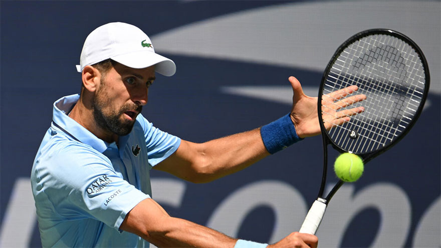 Djokovic fights off qualifier to make US Open third round