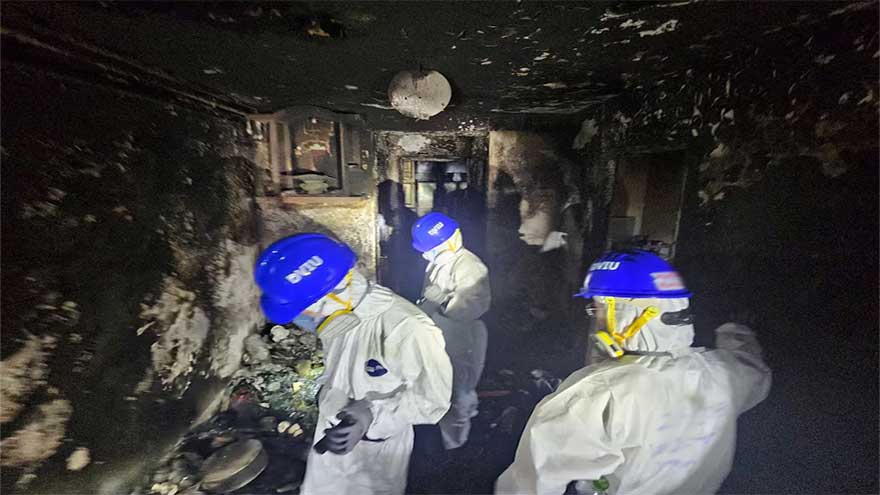 Police comb fire-ravaged Hong Kong apartments, death toll at 151