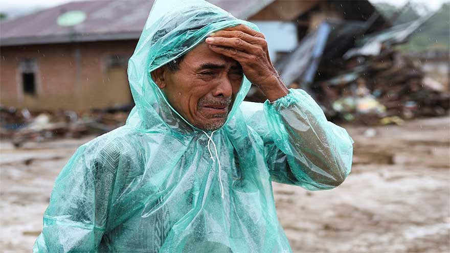 'Is she alive?': Indonesian man's hopes of finding missing wife fade after flood disaster