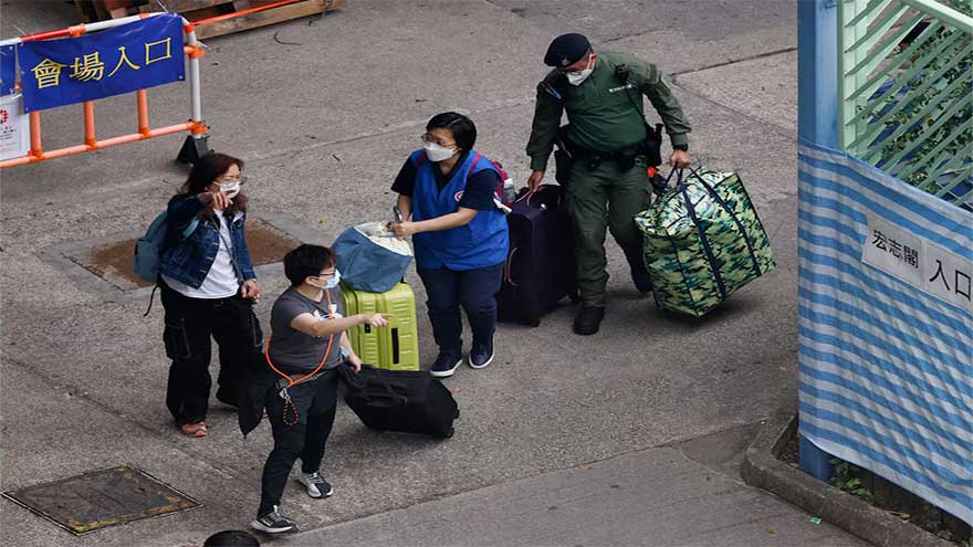A week after Hong Kong's deadly fire, some residents return for belongings