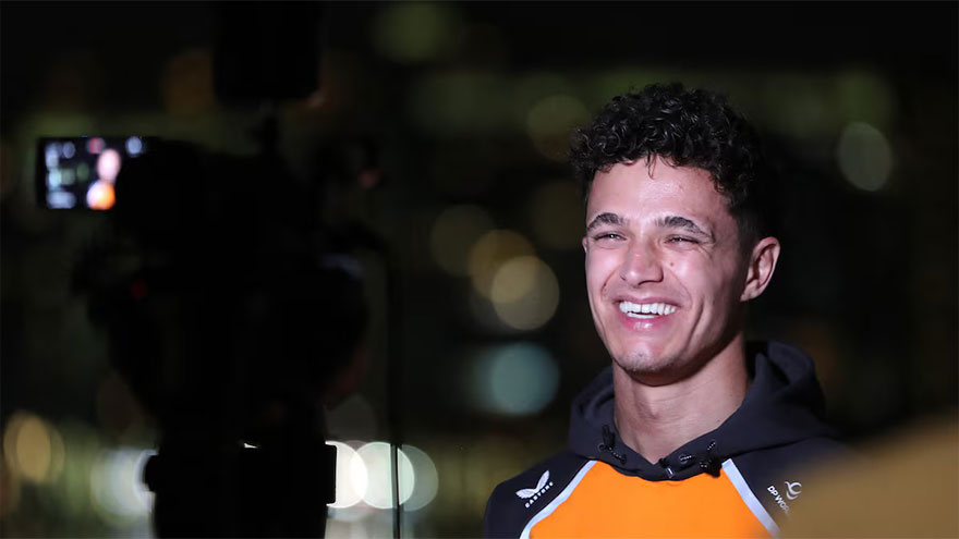 Norris gets his hands on F1 trophy as unwell Verstappen stays away