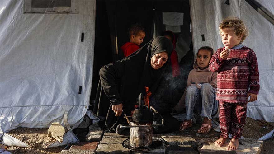 'Shivering from cold and fear': winter rains batter displaced Gazans