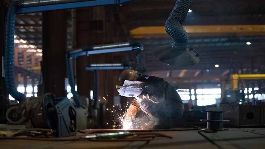 China's factory activity snaps eight-month slump on festive stockpiling