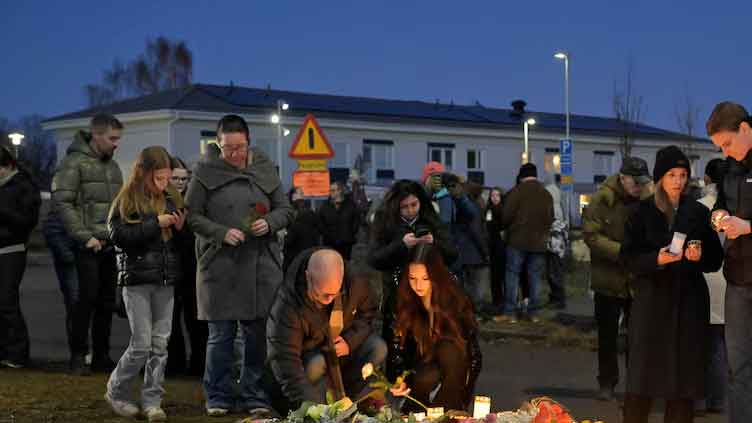 Sweden mourns victims of deadliest gun attack, suspect's motive unknown