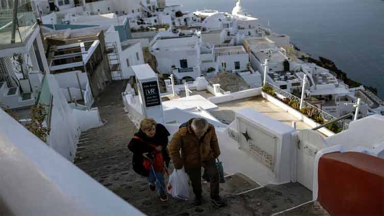 Greek PM says state monitoring Santorini quakes, urges calm